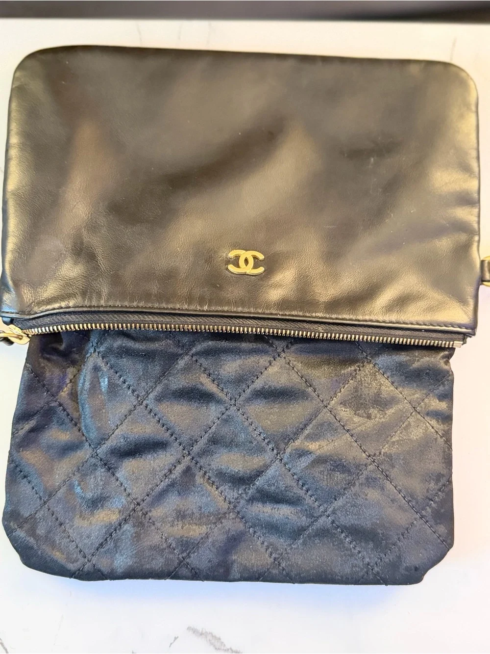CHANEL Black Leather Clutch with Gold Chain and Tassel
